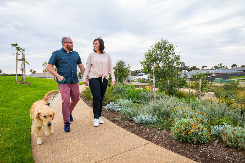 Residents walking through Springwood's Highfield Reserve